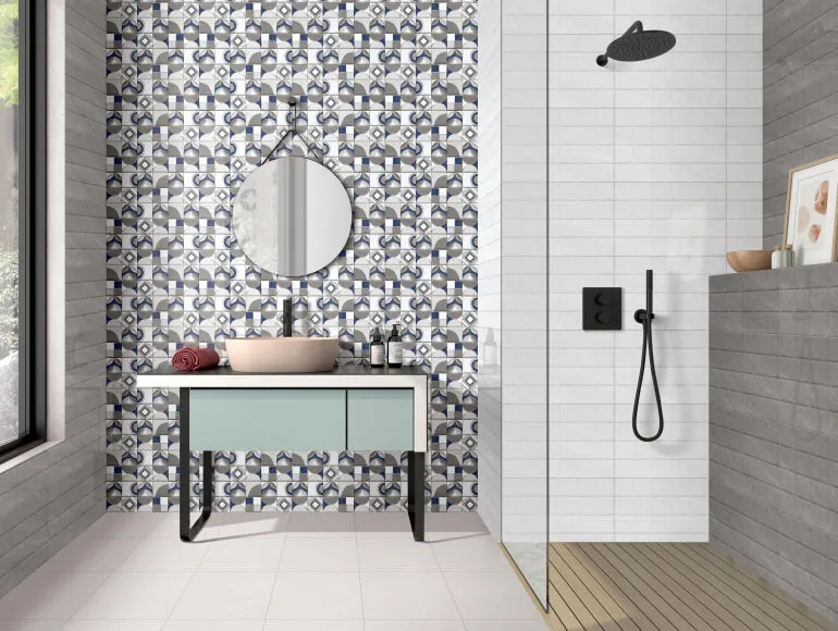 Contemporary mosic bathroom with geometric wall patterns and a shower enclosure